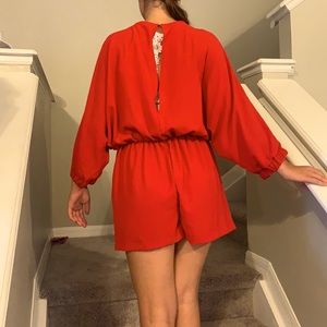 Red short jumpsuit from Zara